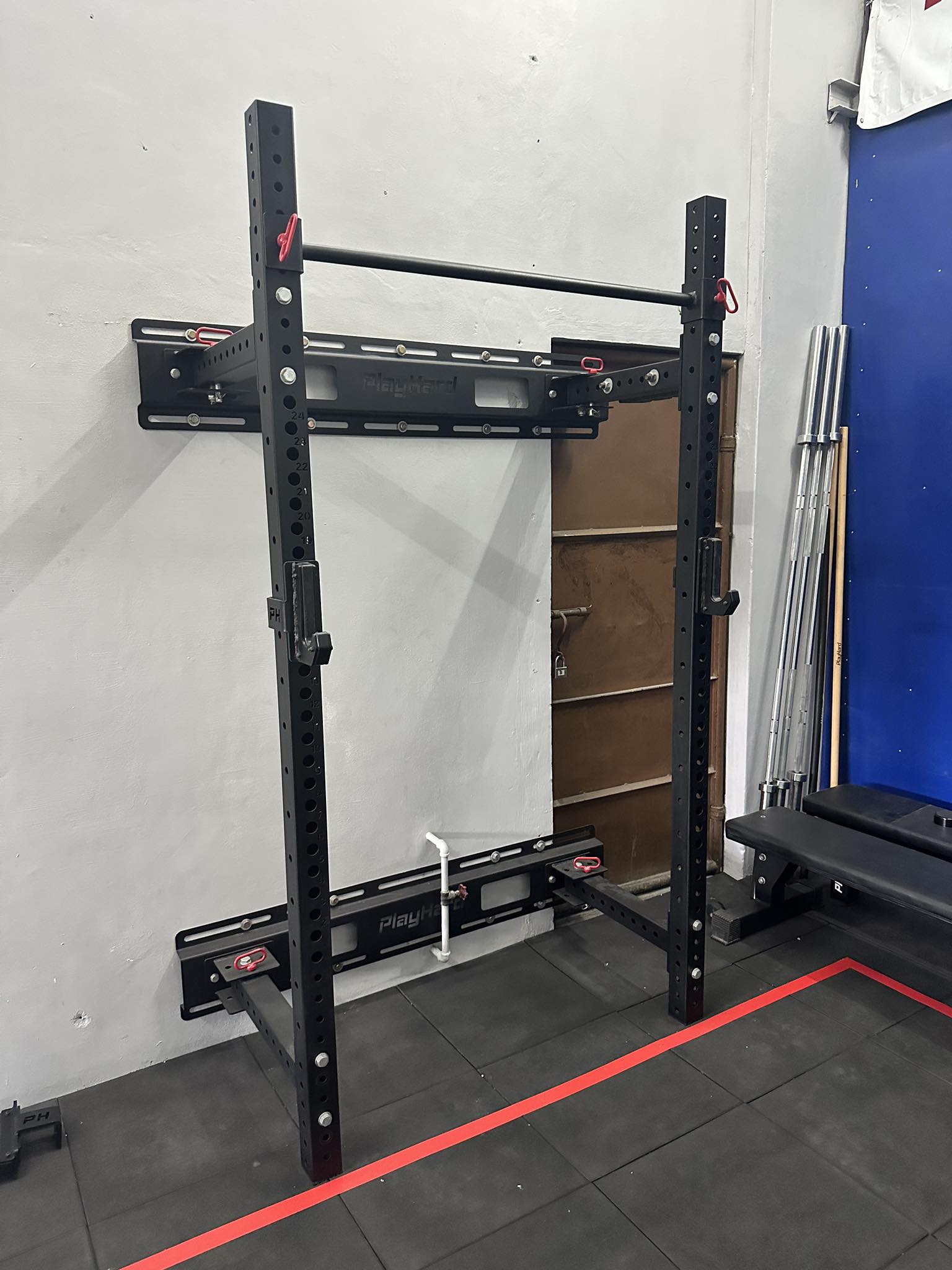 PlayHard Wall-Mounted Folding Power Rack w/ Stringers – Hawkeye Sports